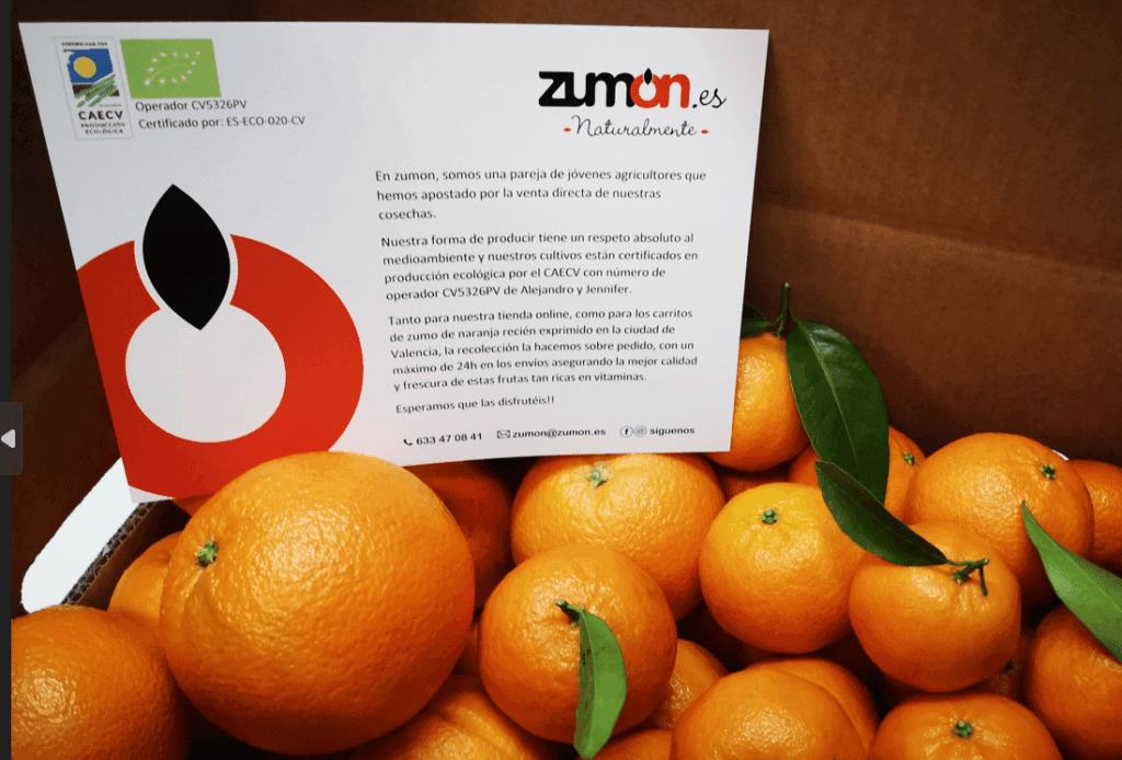 naranjas-zumón Caja de naranjas con una nota de Zumón dónde explica quiénes son